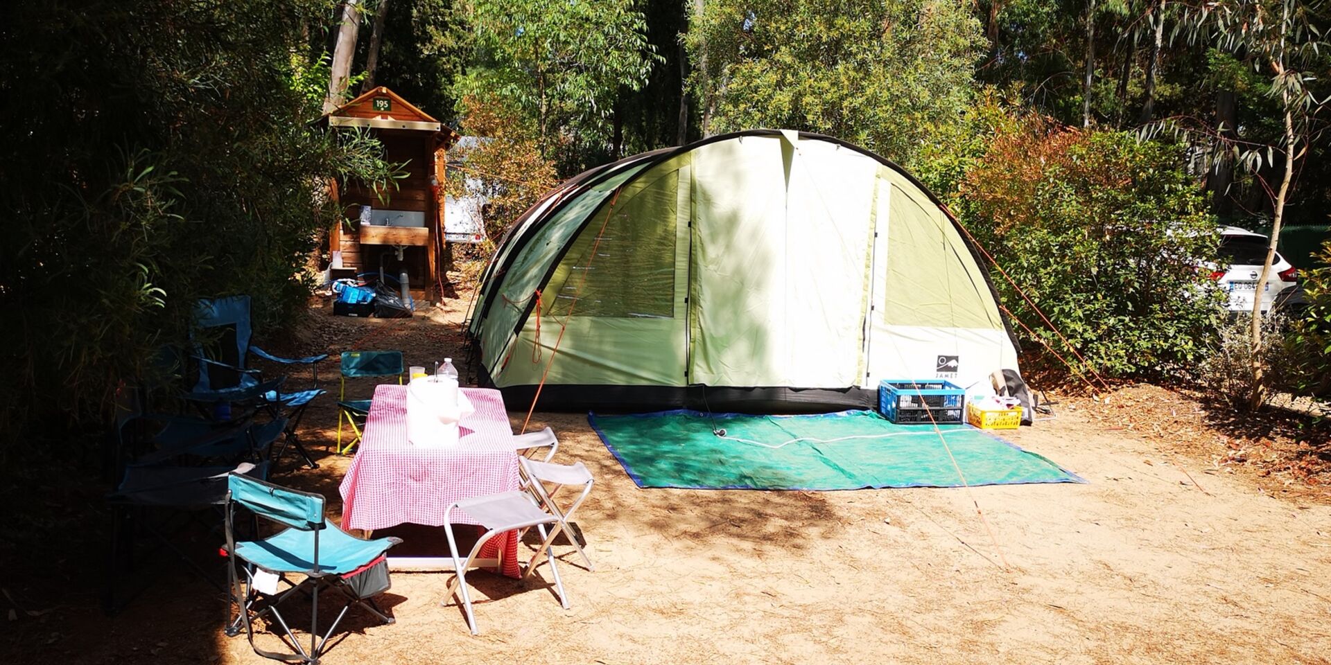 Caravan pitches at our shaded campsite